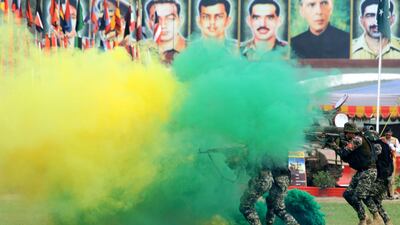 Pakistani soldiers show their skills during an event on the eve of the Defense Day in Peshawar, Pakistan. EPA