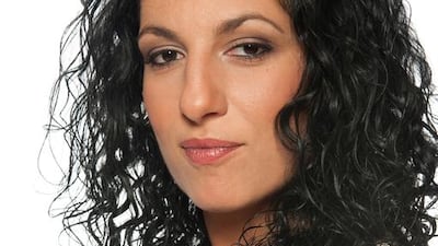 The multilingual comic Eman El-Husseini. Photo by Amelie Cousineau