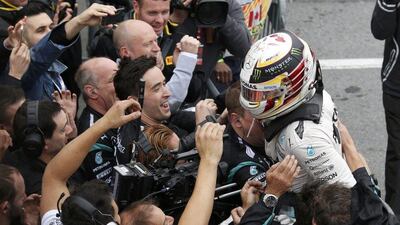 Mercedes driver Lewis Hamilton celebrates winning the Formula One Canadian Grand Prix. Chris Wattie / Reuters