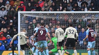 Liverpool's Fabinho, left, scores the opening goal at Turf Moor on Sunday. AFP
