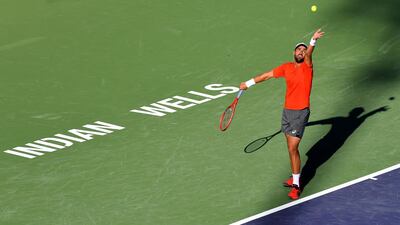 Steve Johnson serves during his first-round match against fellow American Taylor Fritz at Indian Wells. Reuters