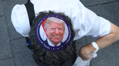 A man wears a Donald Trump kipa as people attend a 'Rise Up for Gaza' rally calling for humanitarian aid and an end to the siege of Gaza at Columbus Circle in New York on Friday. AFP