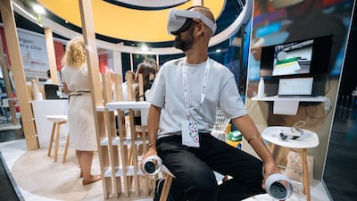 A delegate wears a headset at the festival. Courtesy CogX