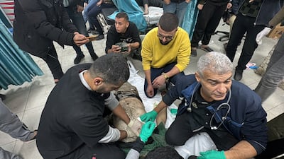 A wounded Palestinian is assisted at Kamal Adwan hospital in Beit Lahiya, in the northern Gaza Strip. Reuters