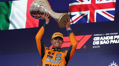 McLaren's Lando Norris celebrates victory in Brazil. Reuters