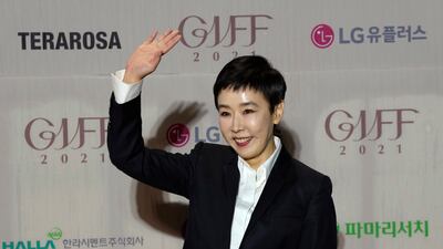 South Korean actress Kang Soo-youn, who has died at the age of 55, waves on the red carpet at the 2021 Gangneung International Film Festival in Gangneung, South Korea. AP Photo