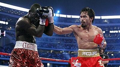 Manny Pacquiao on the attack in the 11th round against Ghana's Joshua Clottey.