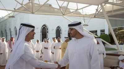 Sheikh Mohammed bin Zayed, Crown Prince of Abu Dhabi Deputy Supreme Commander of the Armed Forces, receives a serviceman injured in Yemen, during a Sea Palace barza. Mohamed Al Hammadi / Crown Prince Court - Abu Dhabi