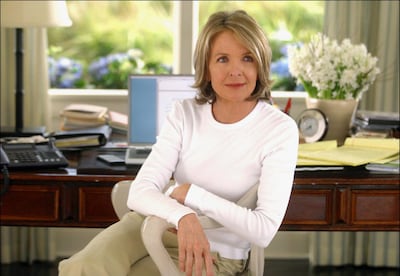 Diane Keaton's beach house in 'Something's Gotta Give' has dark colour accents, fresh flowers and marine-inspired artwork against a light cream backdrop. Courtesy Sony Pictures