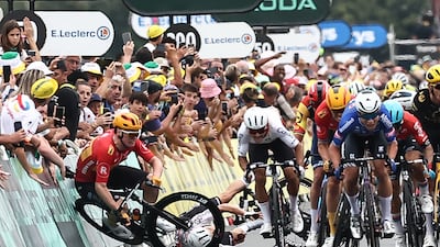 Uno-X Pro Cycling Team rider Soren Waerenskjold crashes during the sprint finish on Stage 4 of the Tour de France, on July 4, 2023. AFP