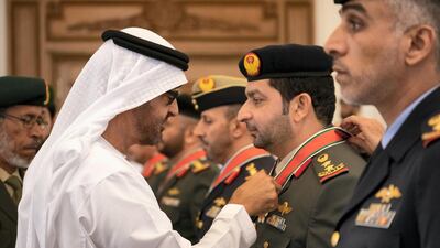 Sheikh Mohamed bin Zayed presents an Emirates Military Medals to members of the UAE Armed Forces, Ministry of Interior and Abu Dhabi Police during a Sea Palace barza.
