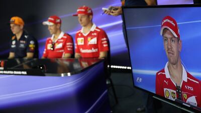 Sebastian Vettel of Germany and Ferrari is shown on a screen in the Drivers Press Conference during previews for the Malaysia Formula One Grand Prix at Sepang Circuit. Clive Mason / Getty Images