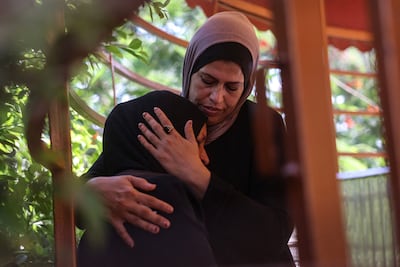 Mourners at the funeral of 13-year-old Palestinian girl Alin Al Farra, who was reportedly killed in an Israeli strike in Gaza on Tuesday. AFP