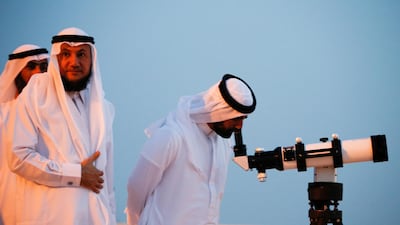 Men gather to sight the new crescent moon for the holy month of Ramadan during sandy weather at the peak of mount of Hafeet in Al-Ain, United Arab Emirates, 05 May 2019. Muslims around the world celebrate the holy month of Ramadan by praying during the night time and abstaining from eating, drinking, and sexual acts during the period between sunrise and sunset. Ramadan is the ninth month in the Islamic calendar and it is believed that the revelation of the first verse in Koran was during its last 10 nights. EPA