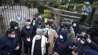 People protest outside Batley Grammar School, northern England, where a teacher was suspended for showing an image of the Prophet Mohammad in class. Getty
