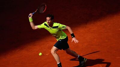 Andy Murray of Great Britain stretches for a shot during his match against Santiago Giraldo of Colombia at the Mutua Madrid Open on May 8, 2014, in Madrid, Spain. Julian Finney / Getty Images