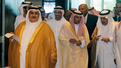 Bahraini foreign minister Sheikh Khalid bin Ahmed Al Khalifa, left, walks in to a press conference as Saudi foreign minister Adel bin Ahmed Al Jubeir, Egyptian foreign minister Sameh Shoukri and Sheikh Abdullah bin Zayed after their talks on their dispute with Qatar, in Manama on July 30, 2017. Hamad I Mohammed / Reuters