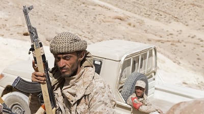 This file photo shows Yemen government fighters on the front line of the battle against Houthi rebels outside Sanaa on February 14, 2018. Bloomberg