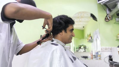 Dr Yogesh Shastri grew his hair for two years in order to donate his extra long locks to charity. Reem Mohammed/The National