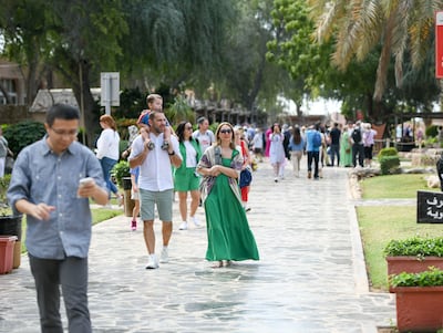 Tourists explore Heritage Village, Abu Dhabi. Airports create value only when connectivity translates into tourism spend, trade flows and business formation. Khushnum Bhandari / The National