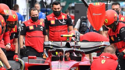 Ferrari crew members practice pit stops at the Albert Park Circuit in Melbourne. AFP
