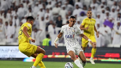 Sofiane Rahimi of Al Ain and Alexis of Al Wasl in action during the UAE Pro League football match between Al Ain v Al Wasl. All pictures by Pawan Singh / The National