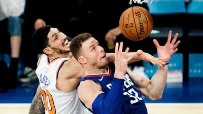 The Knicks' Enes Kanter of Turkey and the Clippers' Blake Griffin battle for a rebound during the first half of the NBA game between the Los Angeles Clippers and the New York Knicks at Madison Square Garden in New York City. Justin Lane / EPA