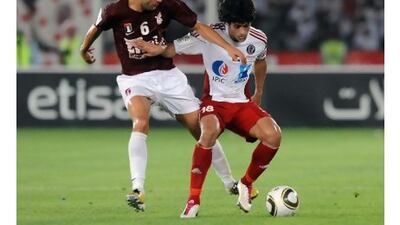 Abdullah Mousa, right, is keen to play in Europe.