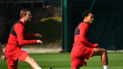 Liverpool midfielder Jordan Henderson defender Trent Alexander-Arnold. AFP