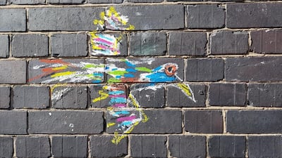 A freshly painted Bird of Paradise on Brick Lane by Sell Out. Photo by Rosemary Behan