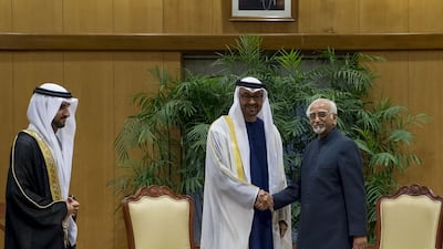 Sheikh Mohammed bin Zayed, Crown Prince of Abu Dhabi and Deputy Supreme Commander of the Armed Forces, greets with Mohammad Hamid Ansari, Vice President of India, at the Vice President House during an official visit to India. Seen with Sheikh Hamdan bin Mohammed, Crown Prince of Dubai. Rashed Al Mansoori / Crown Prince Court - Abu Dhabi