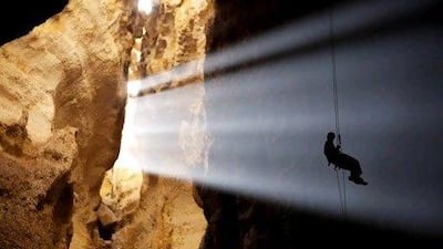 Middle East Caving Expeditionary Team member Pete Pergande abseils the 158 meter Cheryl's Drop, into Majlis Al Jinn on the Salmah Plateau on January 20, 2012. The drop is the deepest free rappel into a cave known in the Arabian peninsula.