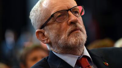 Britain's main opposition Labour Party leader Jeremy Corbyn listens as Britain's main opposition Labour Party shadow Chancellor of the Exchequer John McDonnell delivers a speech on the economy, in Liverpool north west England on November 7, 2019, during their general election campaign. AFP / Oli SCARFF
