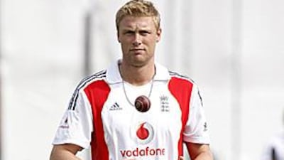 The England all-rounder Andrew Flintoff says he will move his family to Dubai for a few months while he recovers from knee surgery.