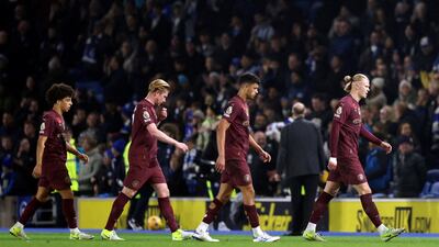 Manchester City players walk off the pitch after their defeat to Brighton on Saturday, November 9, 2024. Reuters