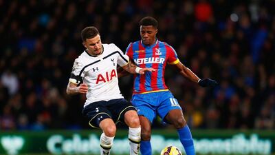 Wilfried Zaha of Crystal Palace takes on Kyle Walker of Spurs during their Premier League match on Saturday. Julian Finney / Getty Images / January 10, 2015