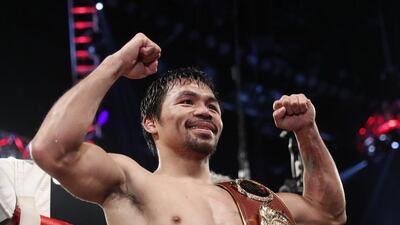 Manny Pacquiao celebrates after defeating Jessie Vargas. Isaac Brekken / AP Photo