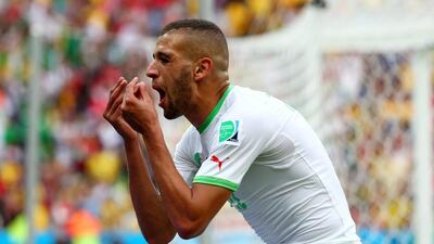 Islam Slimani of Algeria celebrates scoring his team's first goal during their match against South Korea on Sunday at the 2014 World Cup. Quinn Rooney / Getty Images