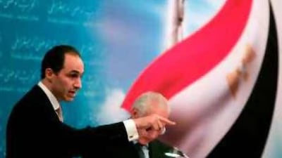 Gamal Mubarak, the son of president Hosni Mubarak and head of the National Democratic Party's policy committee, answers questions at a press conference in Cairo.
