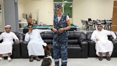 Galina Kogun, a dog trainer, demonstrates to Ras al Khaimah police dog unit personnel the heightened sense of smell of the Sulimov, a breed that is part jackal and part husky. Below, Riv expertly detects the concealed presence of a mere trace of TNT explosive.