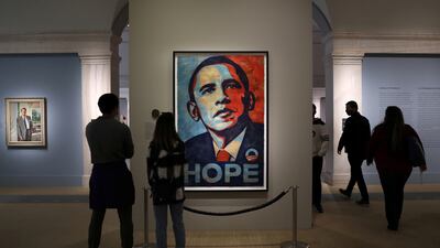 People view a portrait of Mr Obama by Shepard Fairey at the Smithsonian's National Portrait Gallery in Washington. Reuters