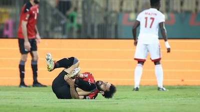 Sudan defender Mazin Mohamedein Alnour Mohamed walks away after leaving Egypt's Mohamed Salah injured. AFP