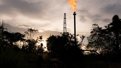 A gas flare in Lago Agrio, Ecuador. Global emissions rose at a slower rate last year, an IEA report says. Reuters
