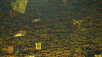 Borussia Dortmund fans inside the stadium with their yellow wall. Reuters