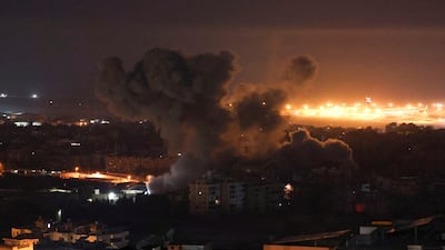 Smoke billows over Beirut's southern suburbs after an Israeli strike. Reuters