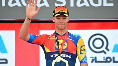 Lidl-Trek team's Italian rider Jonathan Milan on the podium after winning the fourth stage of the UAE Tour. AFP