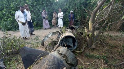 Tribesmen inspect fragments of a Houthi ballistic missile at a farm after it was intercepted by the Saudi-led coalition's air defence forces in Marib, Yemen on February 23, 2018. Ali Owidha / Reuters