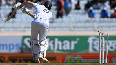England's Zak Crawley is clean bowled by India's Akash Deep. AFP