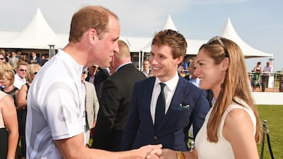 Prince William with actor Eddie Redmayne and his wife Hannah Bagshawe at the Audi Polo Challenge 2015 at Cambridge County Polo Club on July 3, 2015 in Cambridge, England. Getty Images for Audi