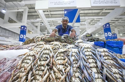 Mohammed Nasir, a vendor inside the seafood section at the Waterfront Market, Deira. Leslie Pableo / The National